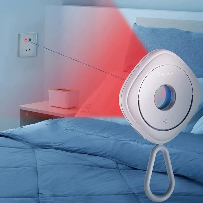 Nexora anti-lost tracker in black with included USB charging cable.